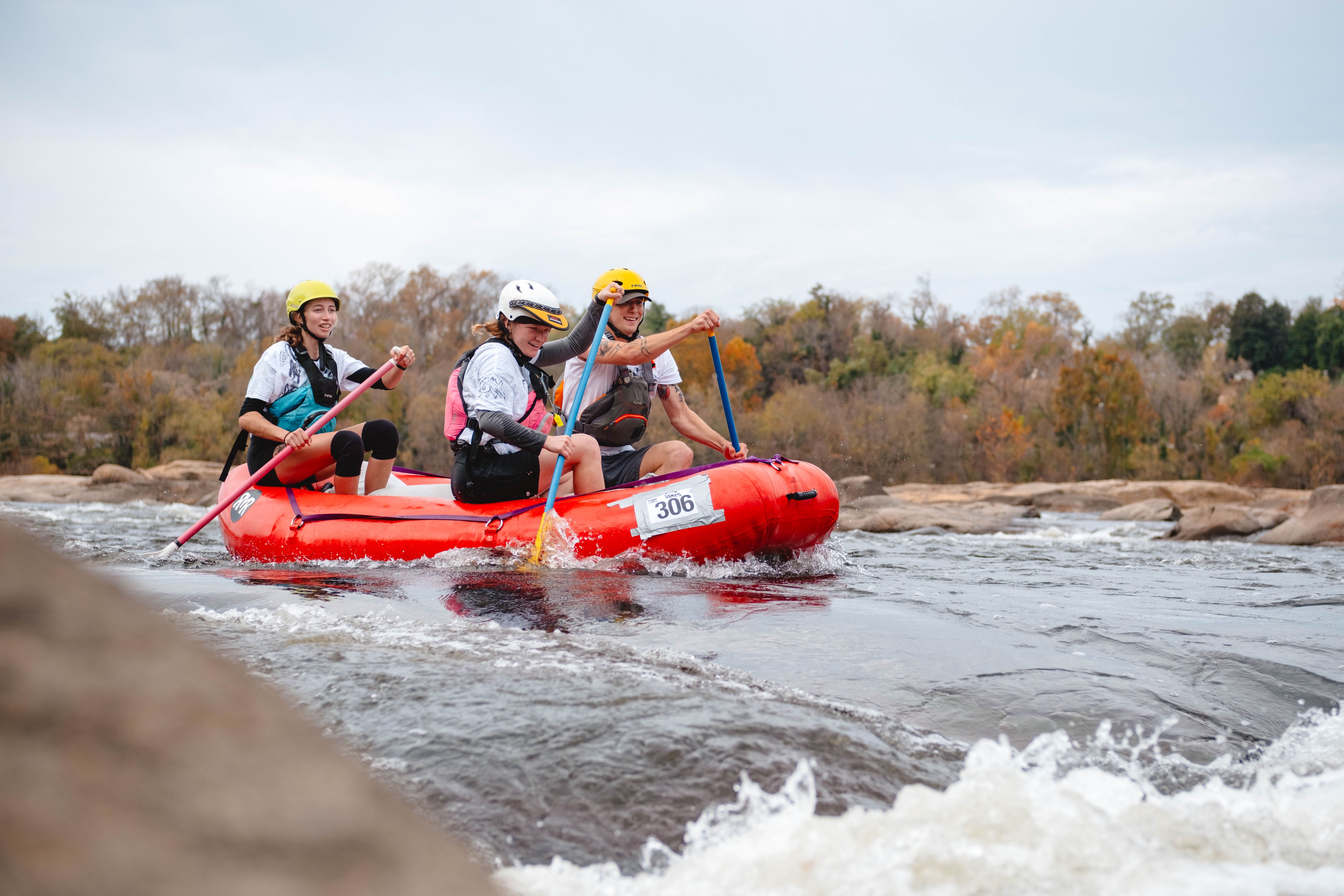 Team paddling on the James River